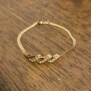 Avon Gold Tone Flat Omega Bracelet with Crystal Accents 7 In